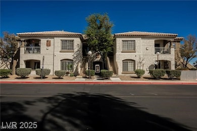 View of front facade with a balcony, stucco siding