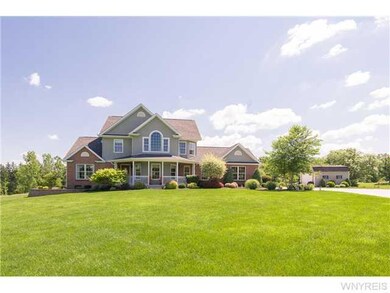 Exterior Front Home sits off the road on a picture