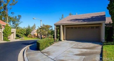 Lush landscape surrounding the home. 2 car attache