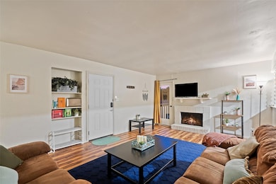 Living area featuring wood finished floors and a 