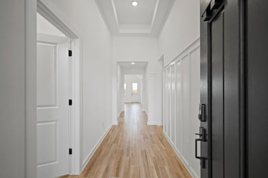 Welcoming foyer with feature wall