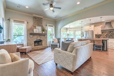 Open family room and kitchen featuring high ceilin