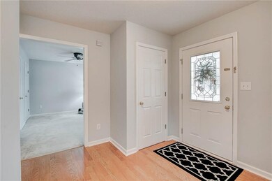 Coat closet and a linen closet in the hallway