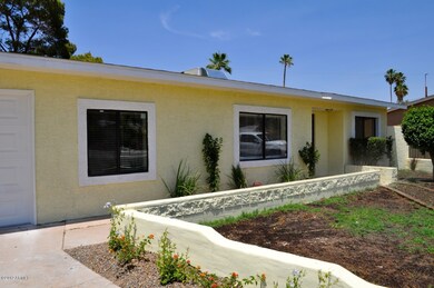 Stucco with dual pane windows.