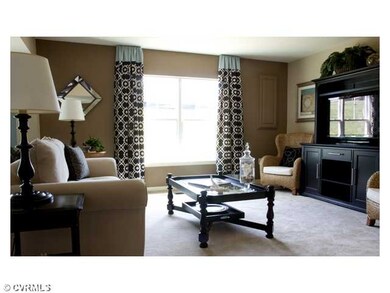 Den/Family/Great Room - Photo is of a home similar