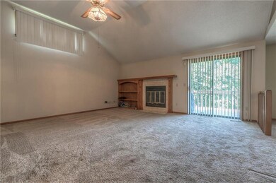 Family Room with Vaulted Ceiling and Fireplace
