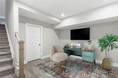 Virtual Staged Office space featuring hardwood / w