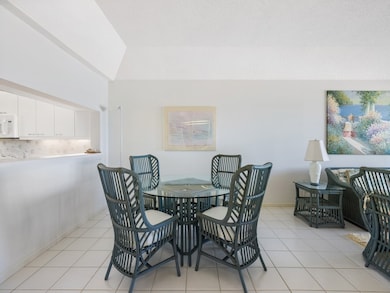 Dining space featuring light tile patterned floors