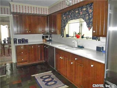 Kitchen. Woodmode kitchen with Corian counters, do