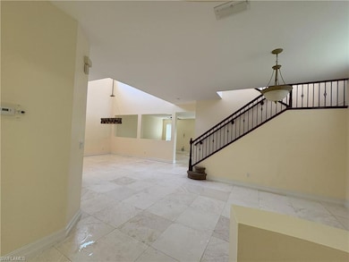 Stairway featuring baseboards