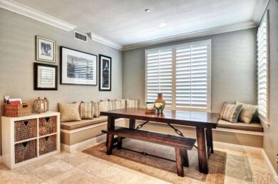 Spacious kitchen nook with banquette seating and s