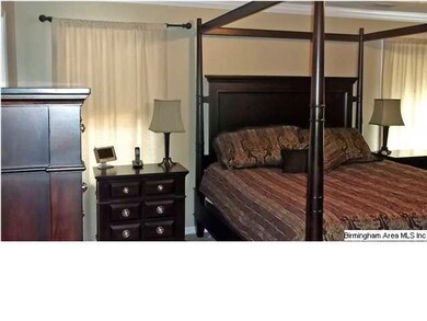 The master bedroom holds whatever furniture you ha