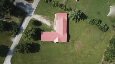 This home is surrounded by a huge yard.