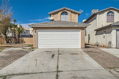 View of front of house with driveway, an attached