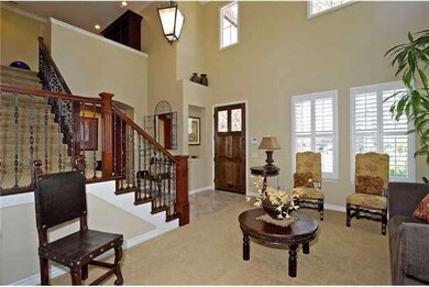 High ceilings and large windows in living room