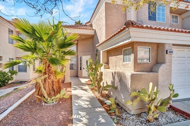View of exterior entry with stucco siding, a tile