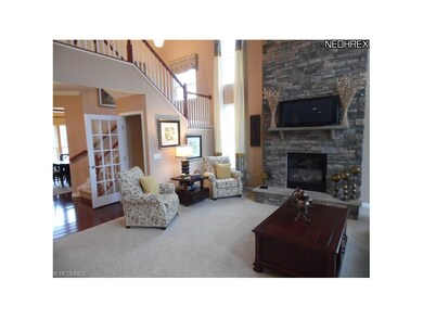 The great room features cathedral ceilings and new