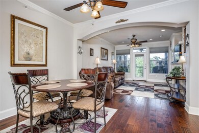 Dining Area with Arched opening into Living Room w