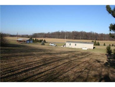 Exterior Back. Over 2 and a half acres of country 