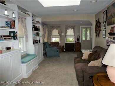 Large Living Room with Built-in Cabinets