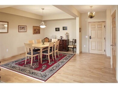 Boxed ceiling frames formal dining room space and 