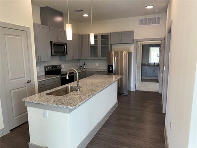 Island Kitchen with Granite Countertops
