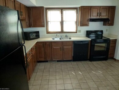 Eat-in Kitchen with tile floors and all appliances
