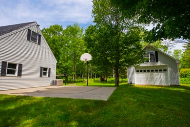 Basketball Court and Detached Garage