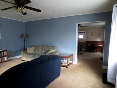 View from living room into the open dining area. G