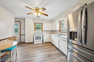 Kitchen with Stainless Steel Fridge