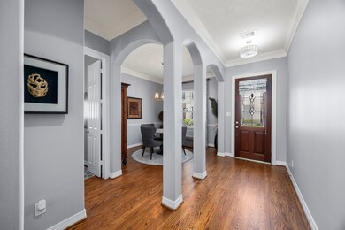 Solid red oak hardwoods greet you at the front ent