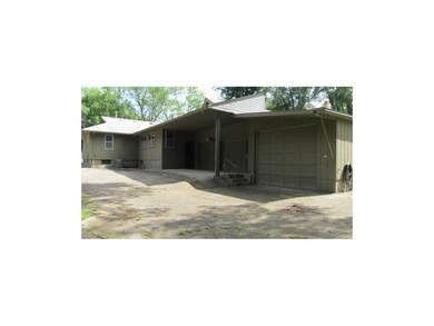 West side Three car garage