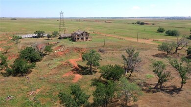 Farm house and hay lot