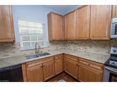 Updated kitchen with granite counter tops and tile