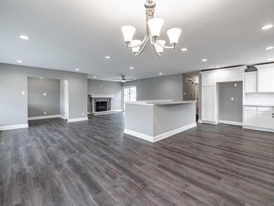 Dining area, entry foyer on the left, living area 