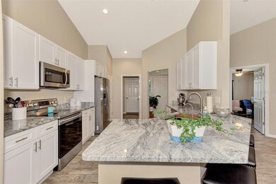 Granite counter tops, soft close cabinets and drawers. Refrigerator, stove/microwave 2017.