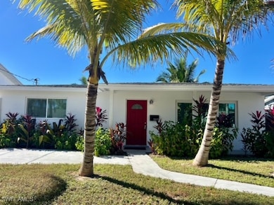 View of front of house with a front yard