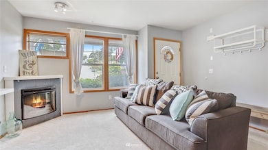 Another view of the spacious living room and entry