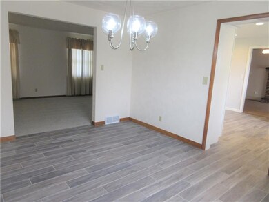 Dining room that is open to the kitchen and living