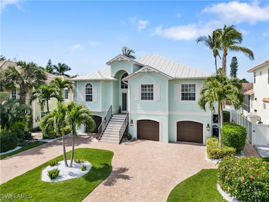View of front facade featuring a garage