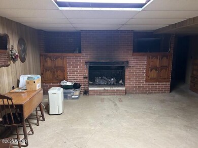 BASEMENT WITH GAS LOG FIREPLACE