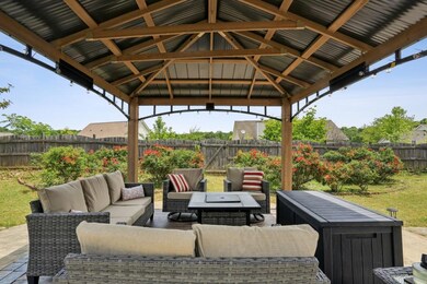 Outdoor Oasis With A Fully Fenced Backyard