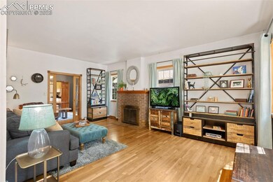 Living room with wood burning fireplace