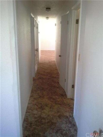 HALLWAY AT THE BEDROOMS/BATHS