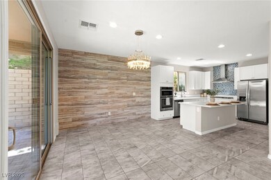 Kitchen featuring appliances with stainless steel
