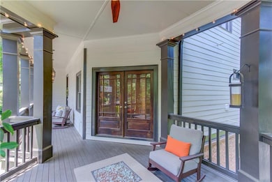 Real wood doors lead to office/bedroom