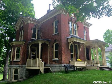 Exterior Front. FRONT PORCH,SIDE PORCH,DECK & PATI