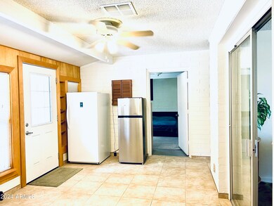 KITCHEN VIEW TO AZ ROOM AND 3RD BEDROOM