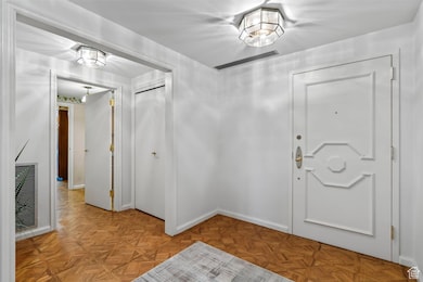 Entryway featuring baseboards