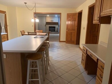 KITCHEN HAS BUILT IN ISLAND AND DESK